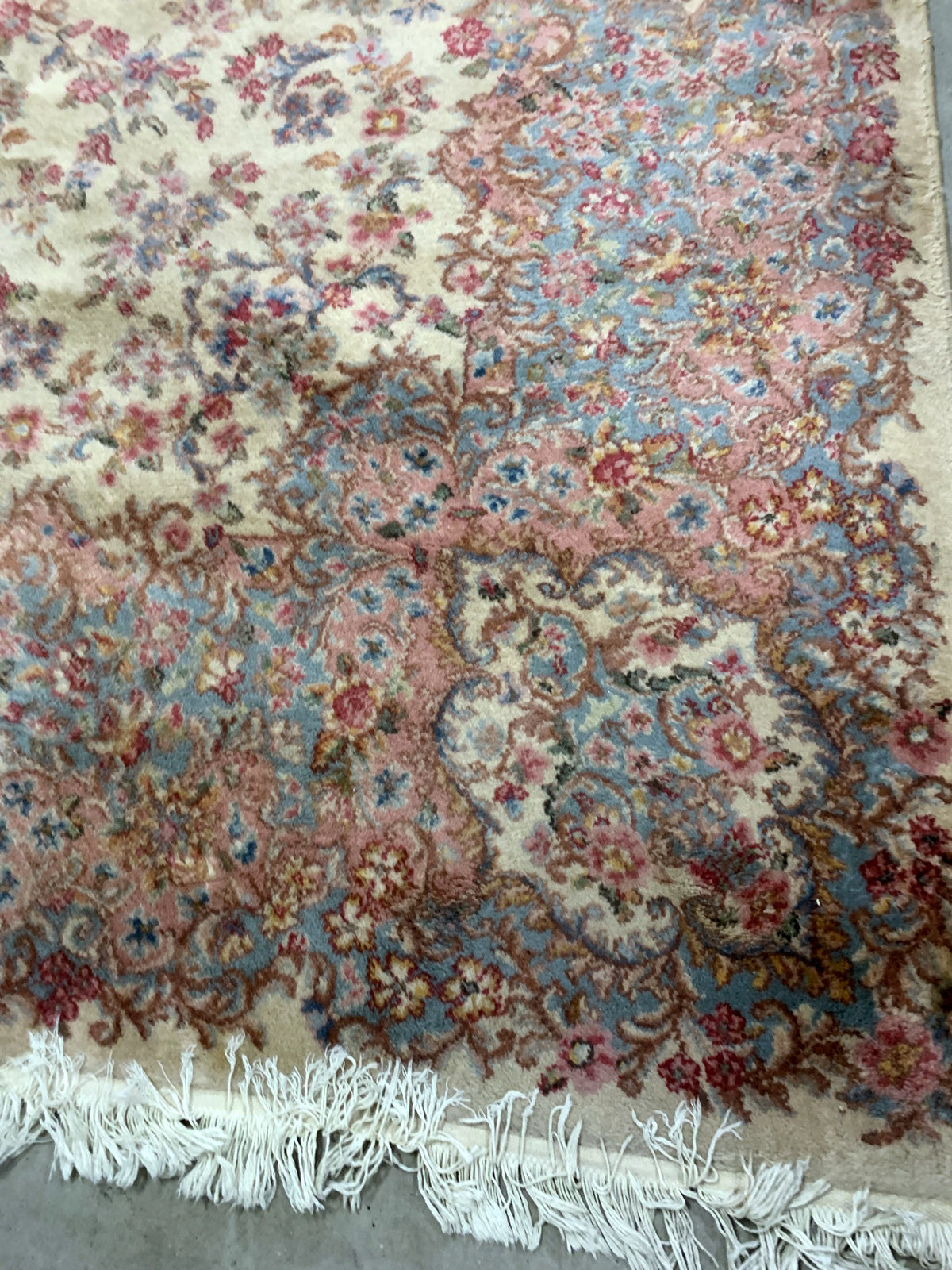 Vintage American Karastan rug made in beige wool. The rug has been made in USA with Persian Kerman design. This piece is from the middle of 20th century in original good condition.