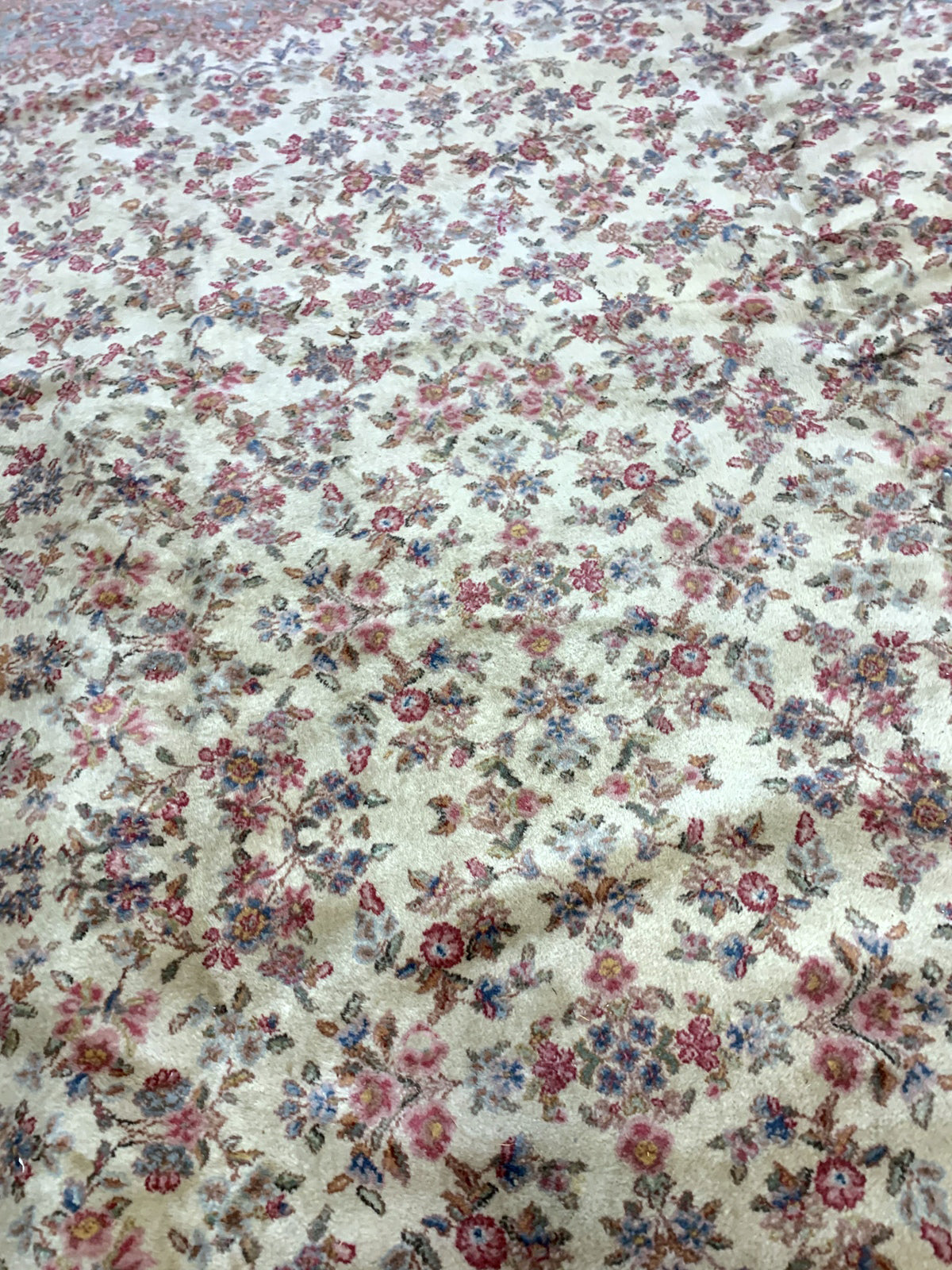 Vintage American Karastan rug made in beige wool. The rug has been made in USA with Persian Kerman design. This piece is from the middle of 20th century in original good condition.