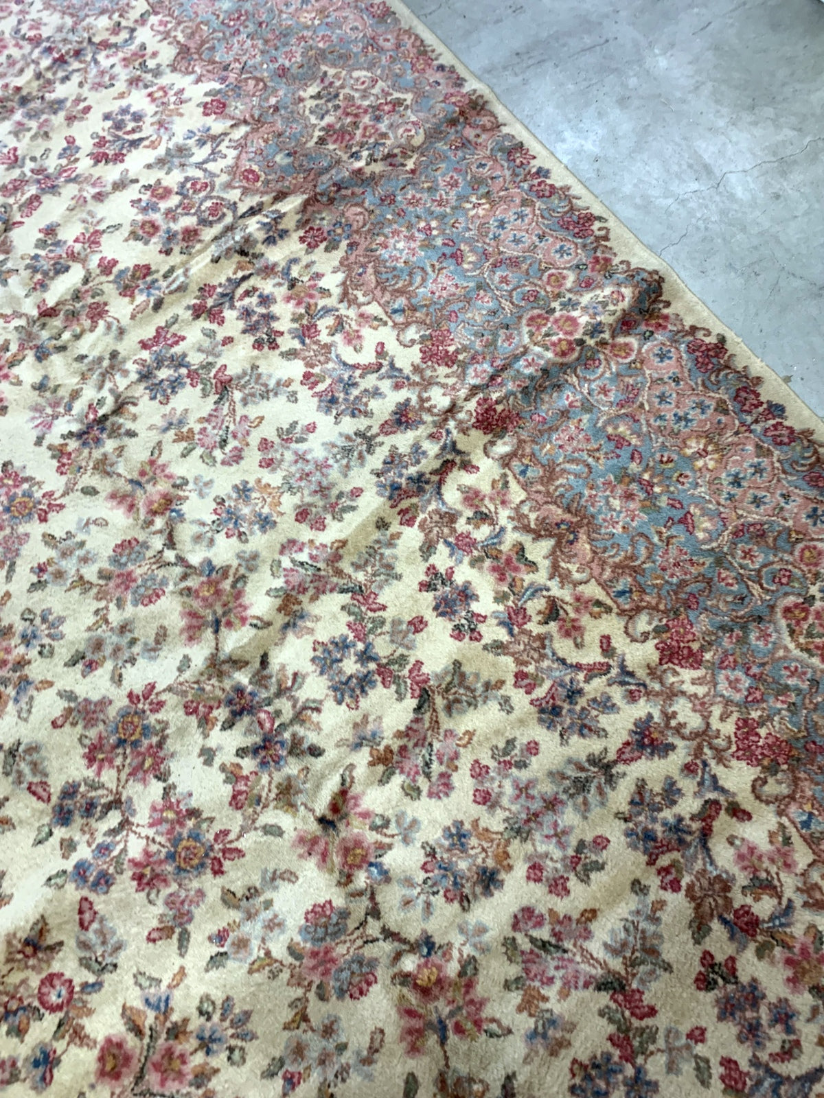 Vintage American Karastan rug made in beige wool. The rug has been made in USA with Persian Kerman design. This piece is from the middle of 20th century in original good condition.