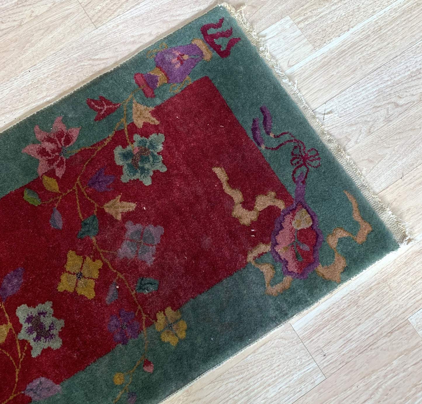 Floral elements on Art Deco rug