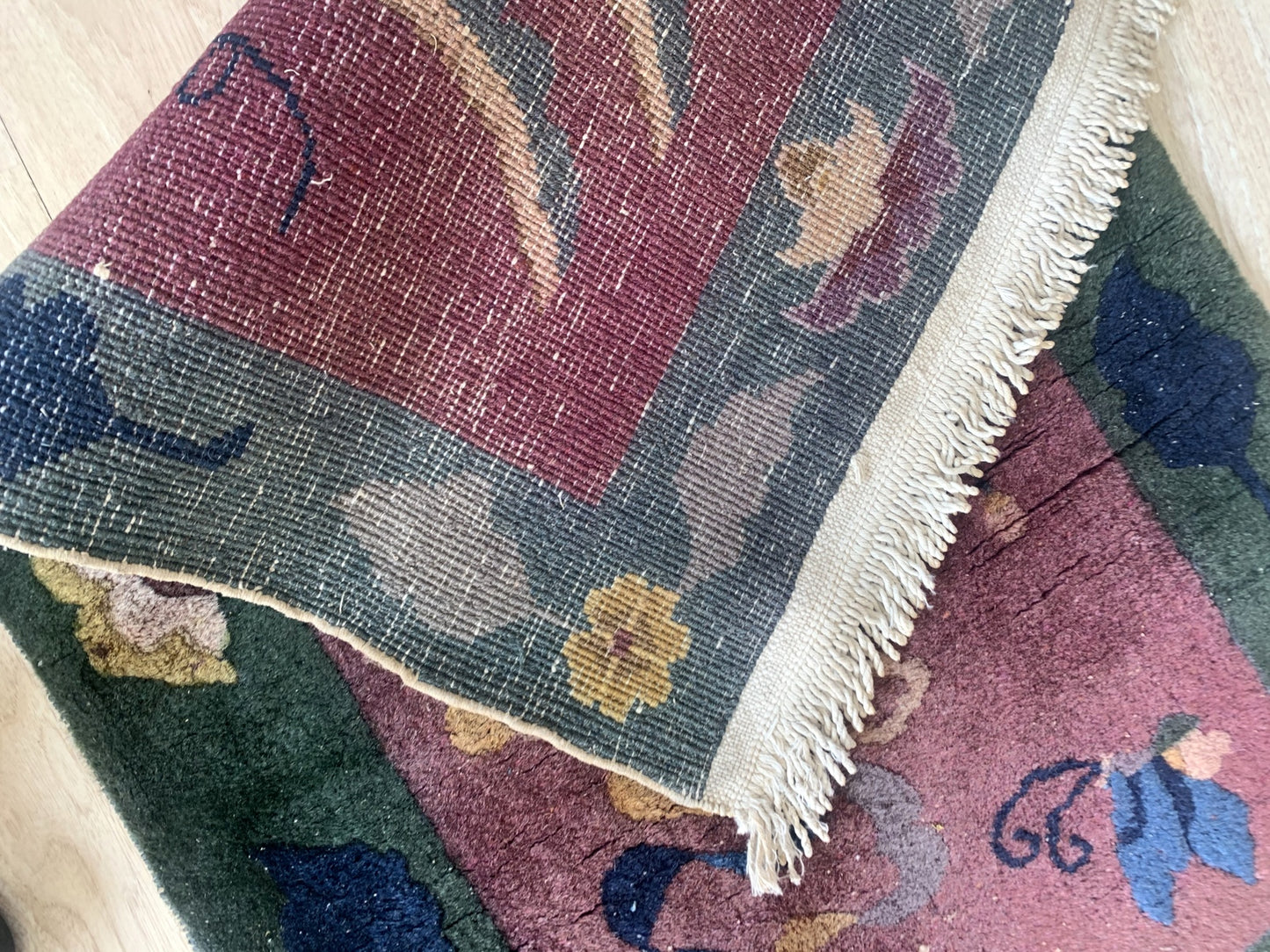 Reverse side of the handmade Chinese rug
