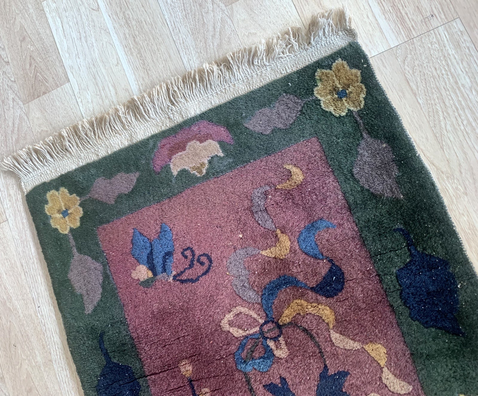 Detailed view of the rug's rich color palette