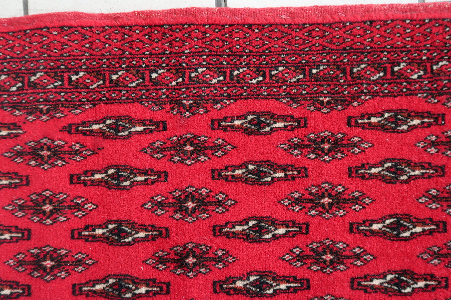 Handmade vintage Turkmen Tekke salt bag in bright red color. The rug has been made in the end of 20th century in original good condition.