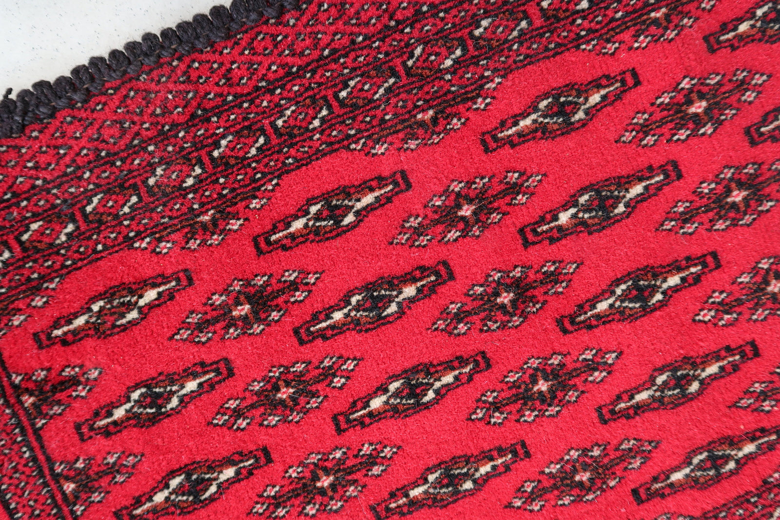 Handmade vintage Turkmen Tekke salt bag in bright red color. The rug has been made in the end of 20th century in original good condition.