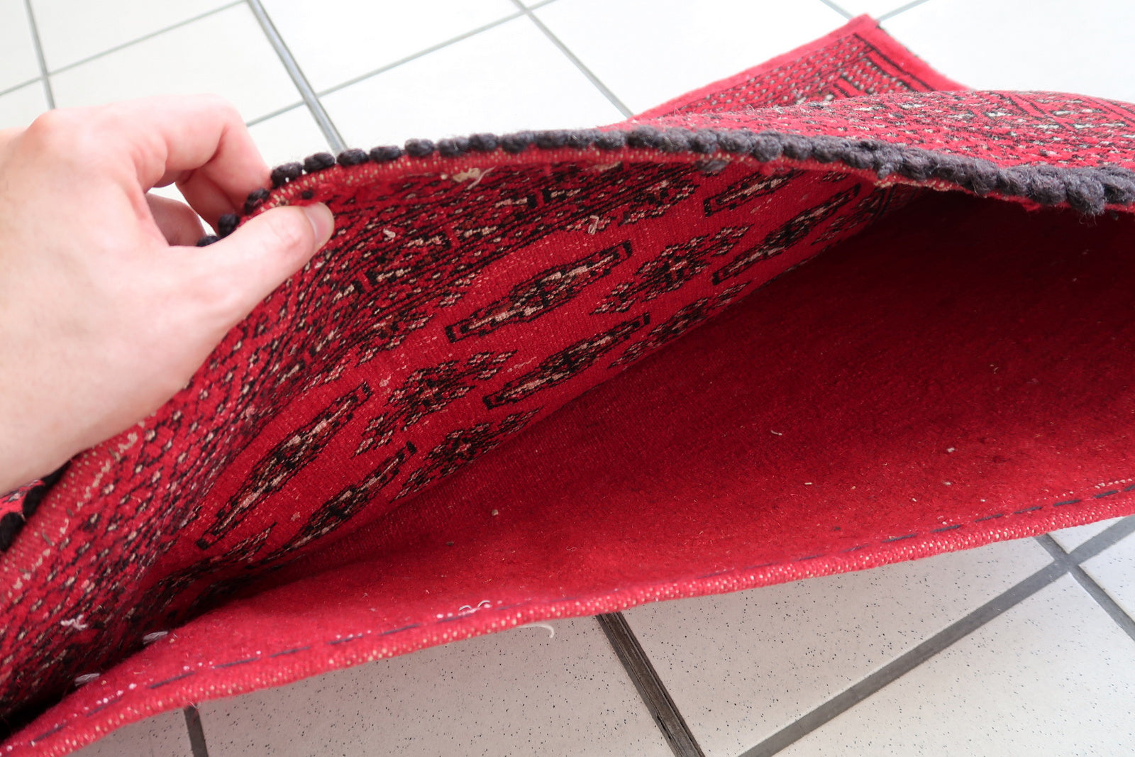 Handmade vintage Turkmen Tekke salt bag in bright red color. The rug has been made in the end of 20th century in original good condition.