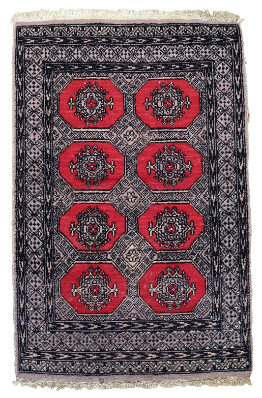 Handmade vintage Uzbek Bukhara rug 1970s