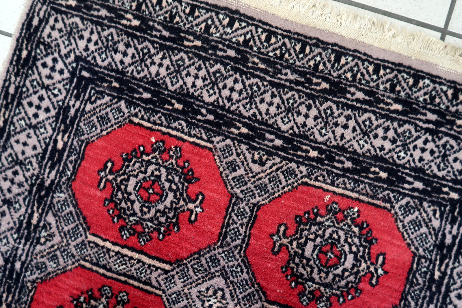 Handmade vintage Uzbek Bukhara rug 1970s