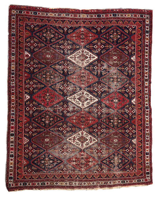 Handmade antique Persian Afshar distressed rug 1910s