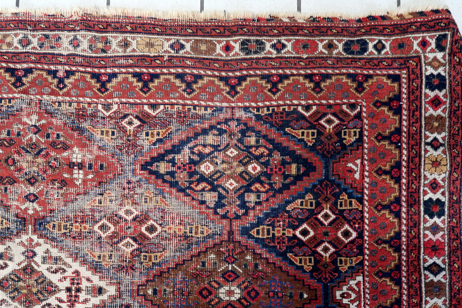 Handmade antique Persian Afshar distressed rug 1910s