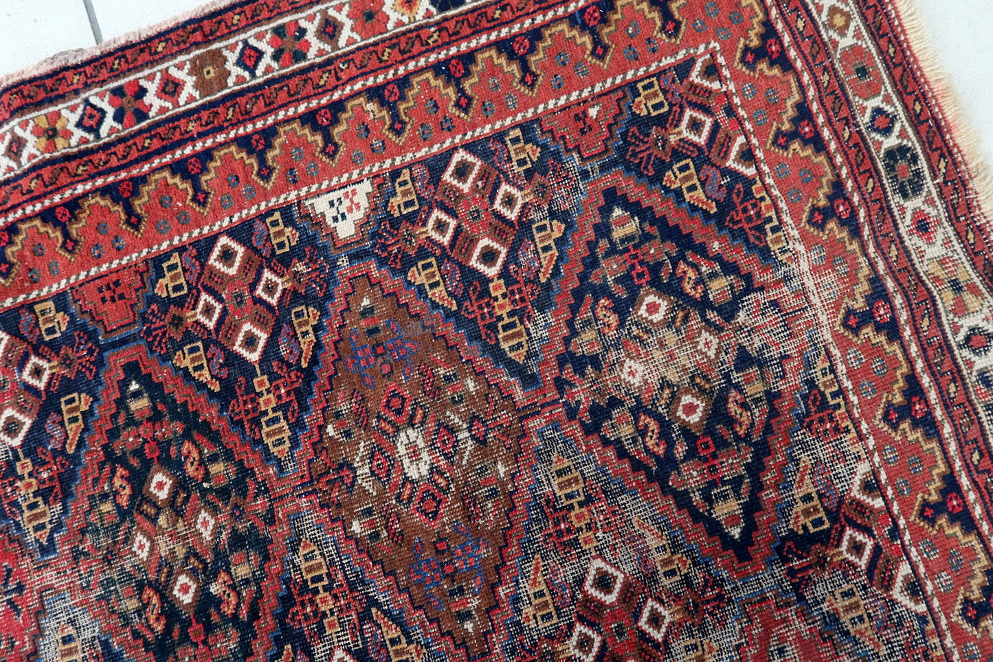 Handmade antique Persian Afshar distressed rug 1910s