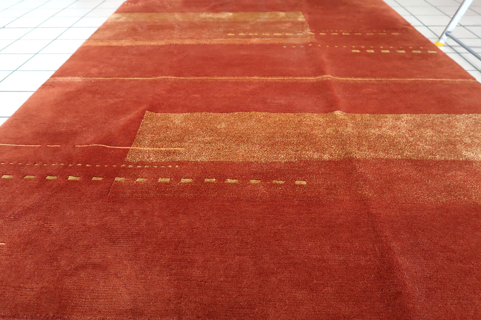Handmade vintage Tibetan Khaden rug in modern geometric design. The rug is from the end of 20th century in original good condition.