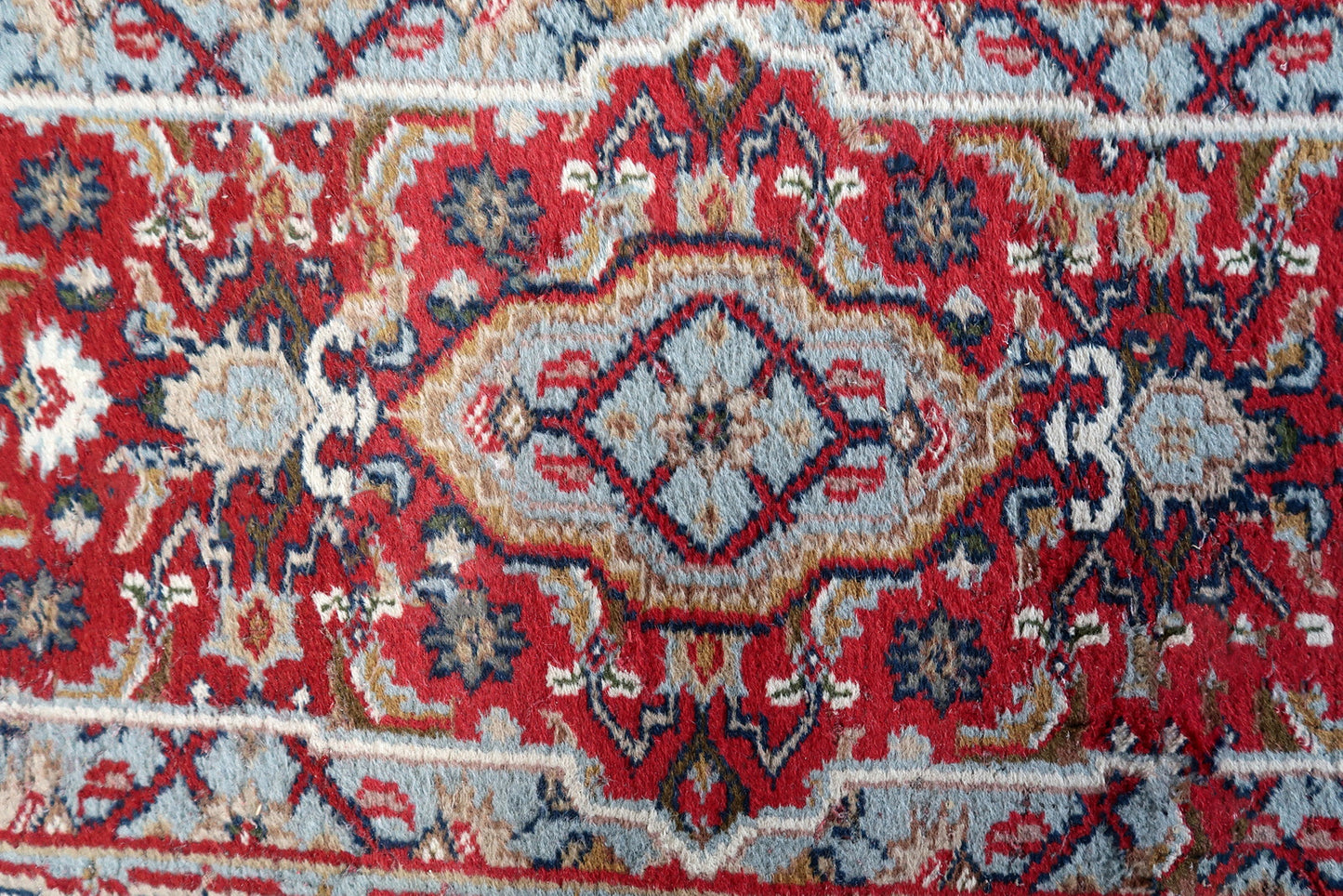 Handmade vintage Persian Hamadan rug with medallion design. The rug is in original condition from the end of 20th century, it has some signs of age.