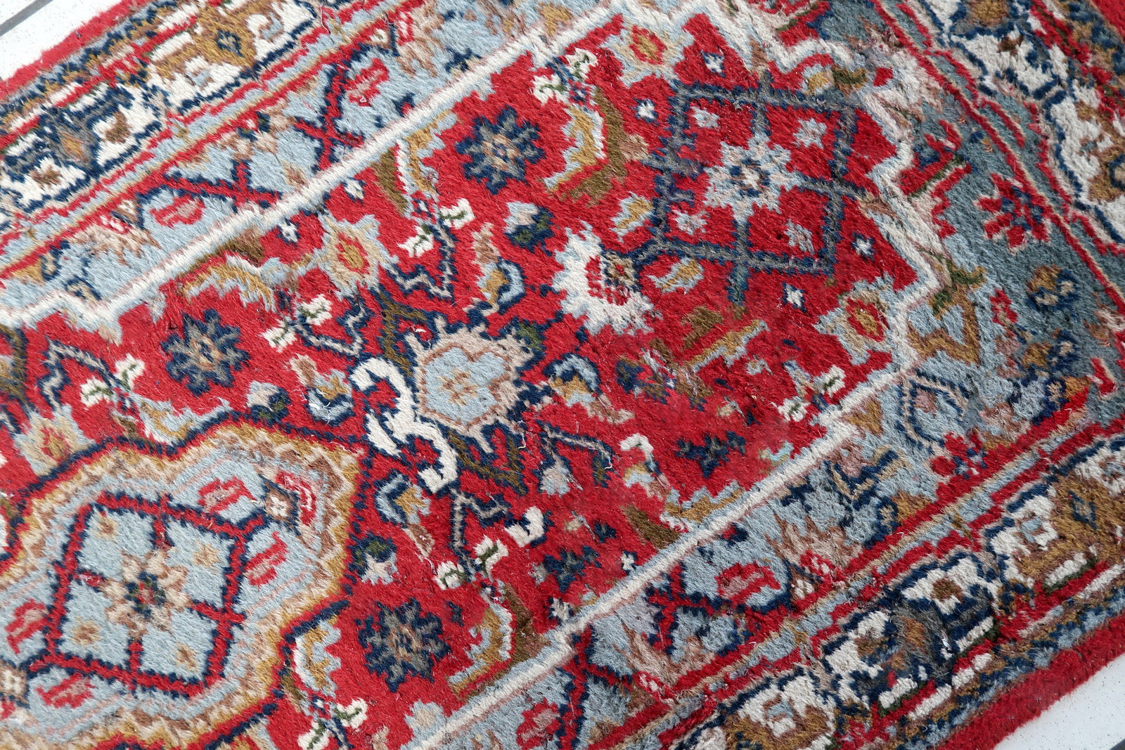 Handmade vintage Persian Hamadan rug with medallion design. The rug is in original condition from the end of 20th century, it has some signs of age.