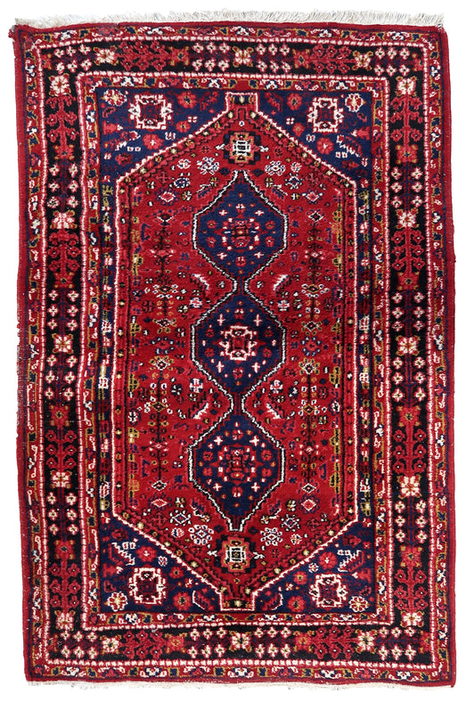 Handmade vintage Persian Shiraz rug 1970s