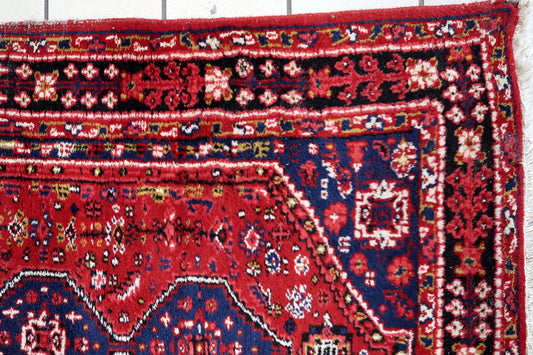 Handmade vintage Persian Shiraz rug 1970s
