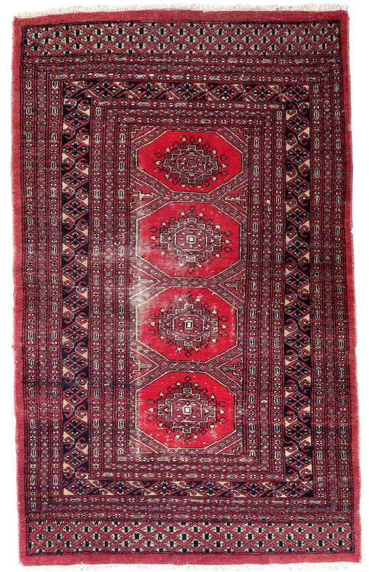 Handmade vintage Uzbek Bukhara rug 1970s