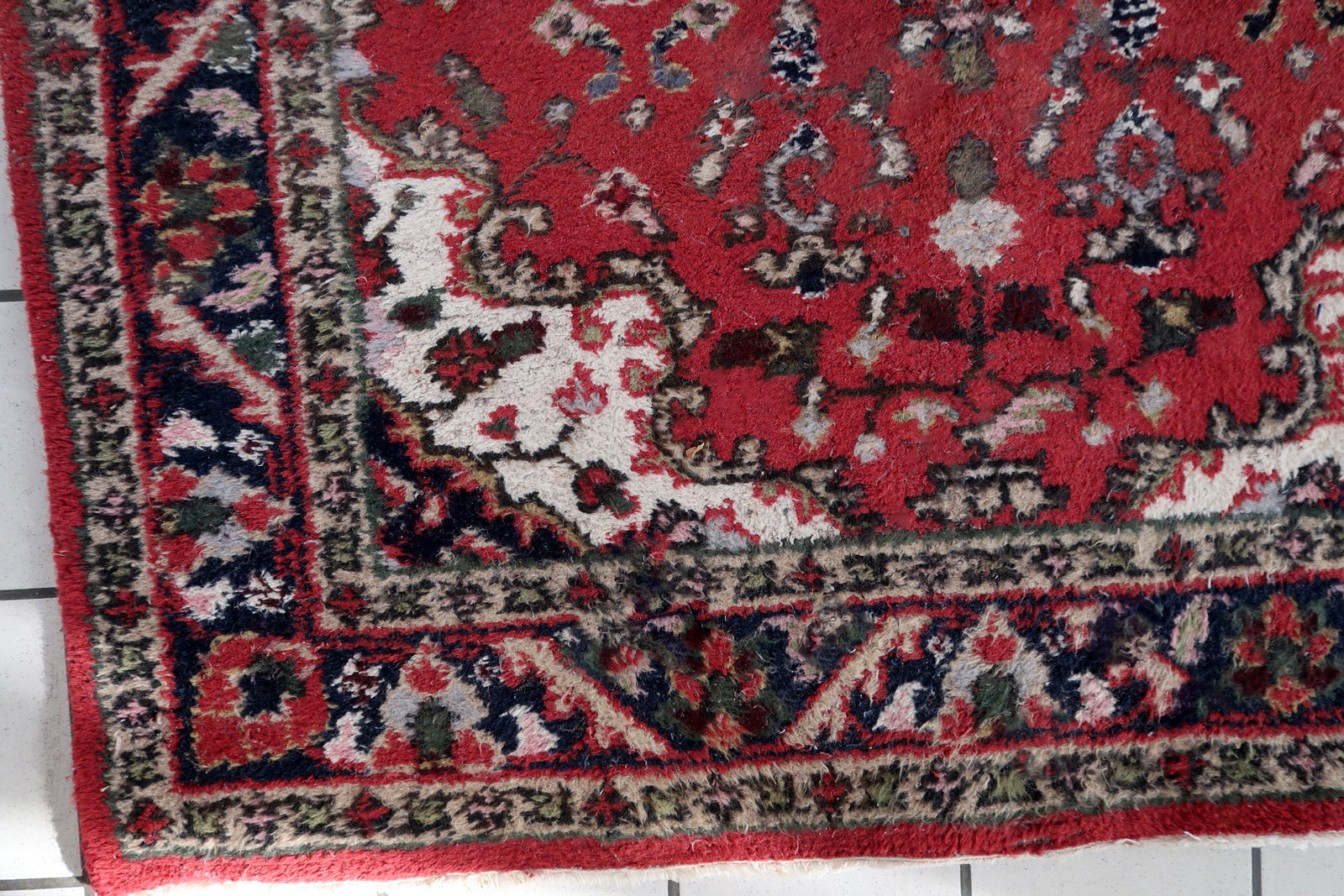 Handmade vintage Persian Hamadan rug in red and blue colors. The rug is from the end of 20th century in original good condition.