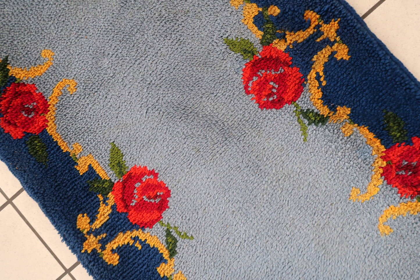 Vintage French Savonnerie runner in blue color and floral design. The rug is from the end of 20th century in original good condition.