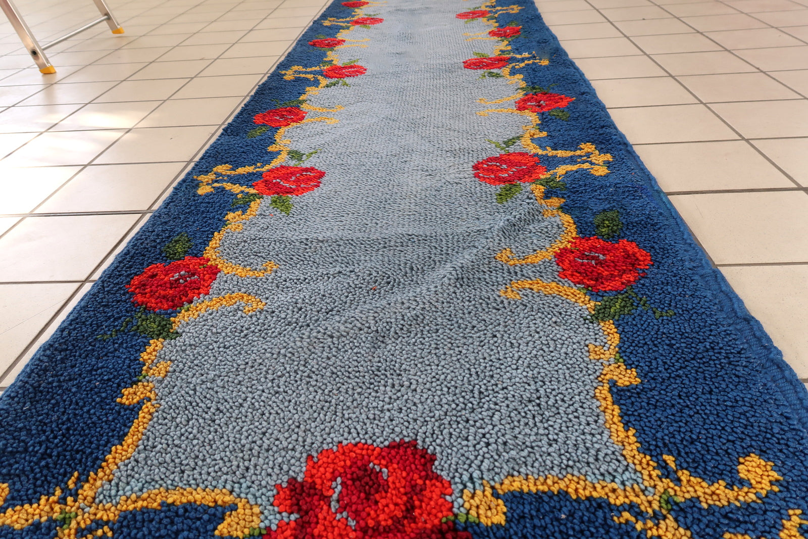 Vintage French Savonnerie runner in blue color and floral design. The rug is from the end of 20th century in original good condition.