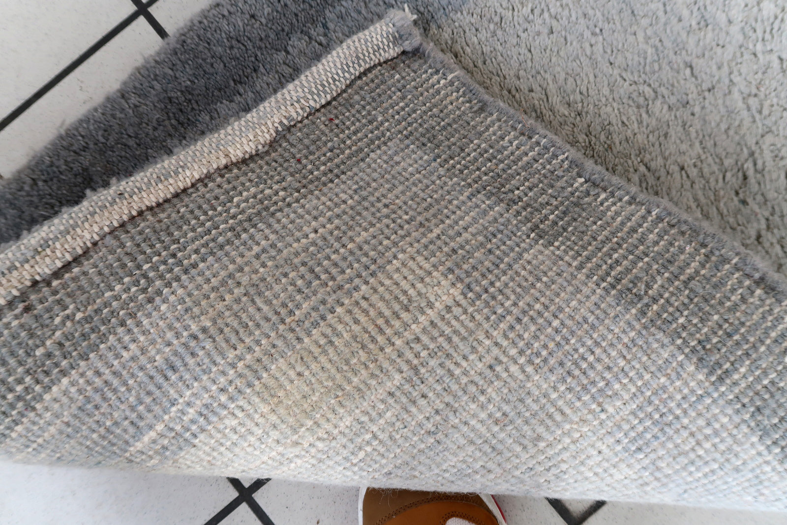 Handmade vintage Persian Gabbeh runner in different shades of grey color. The rug is from the end of 20th century in original good condition.