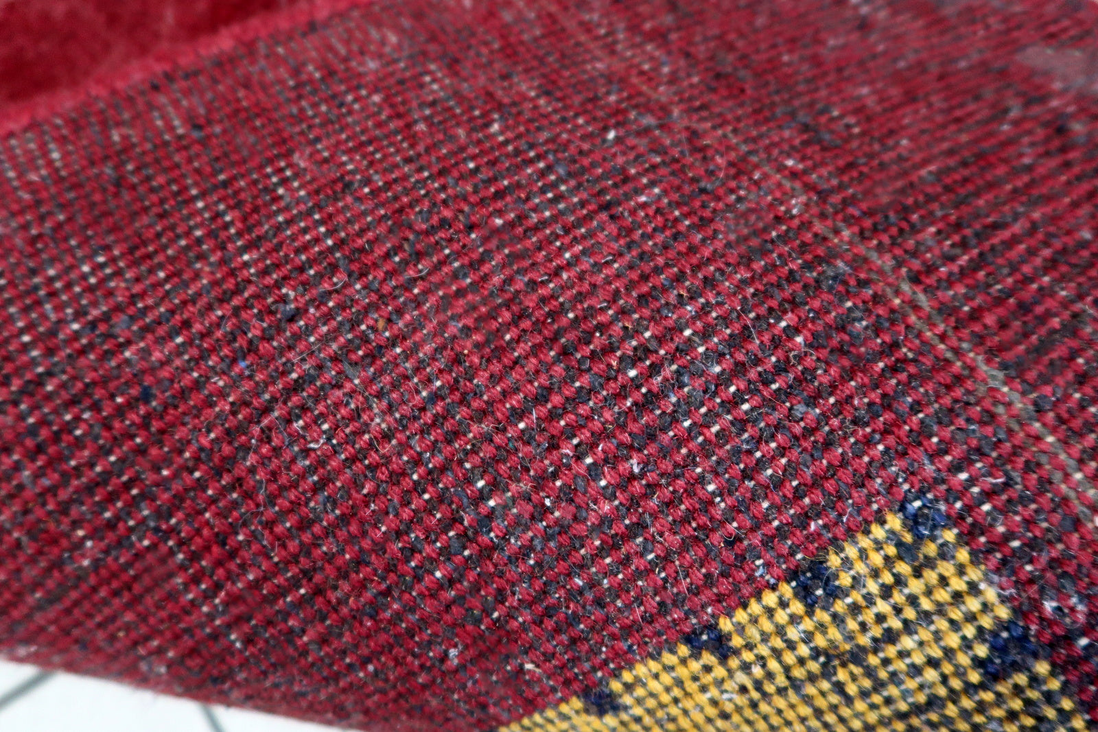 Handmade vintage Persian Gabbeh rug in deep red color and geometric design. The rug is from the end of 20th century in original good condition.