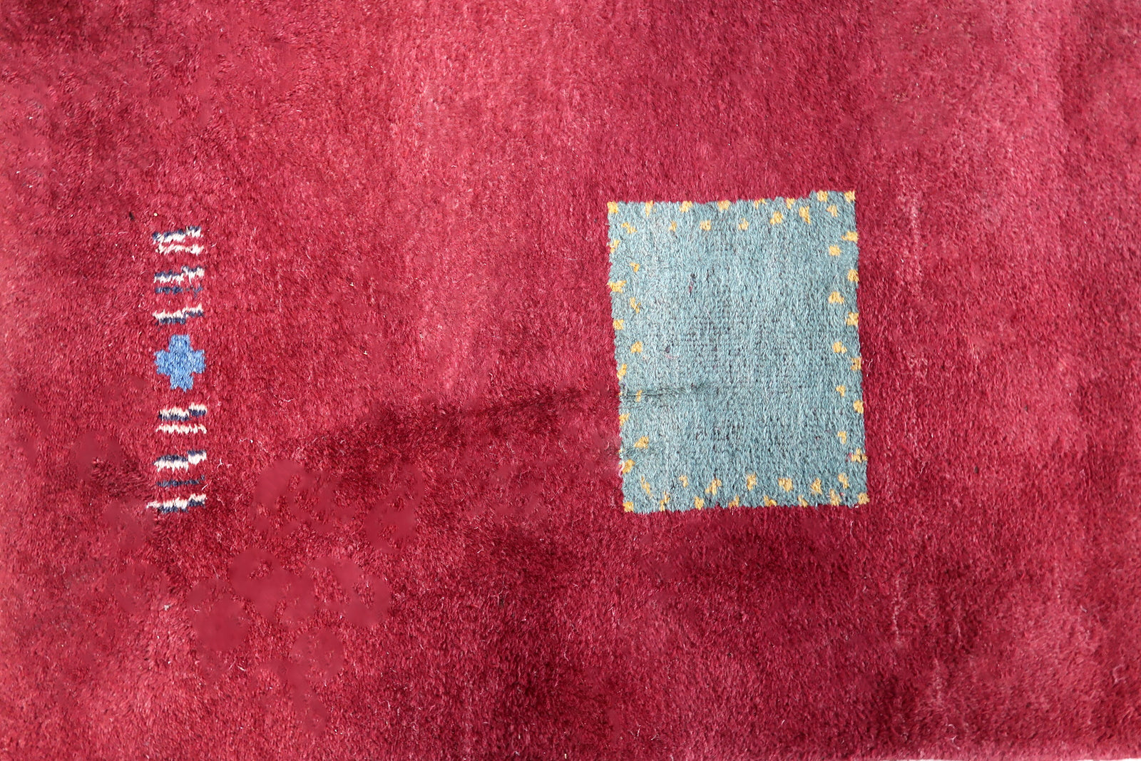 Handmade vintage Persian Gabbeh rug in deep red color and geometric design. The rug is from the end of 20th century in original good condition.