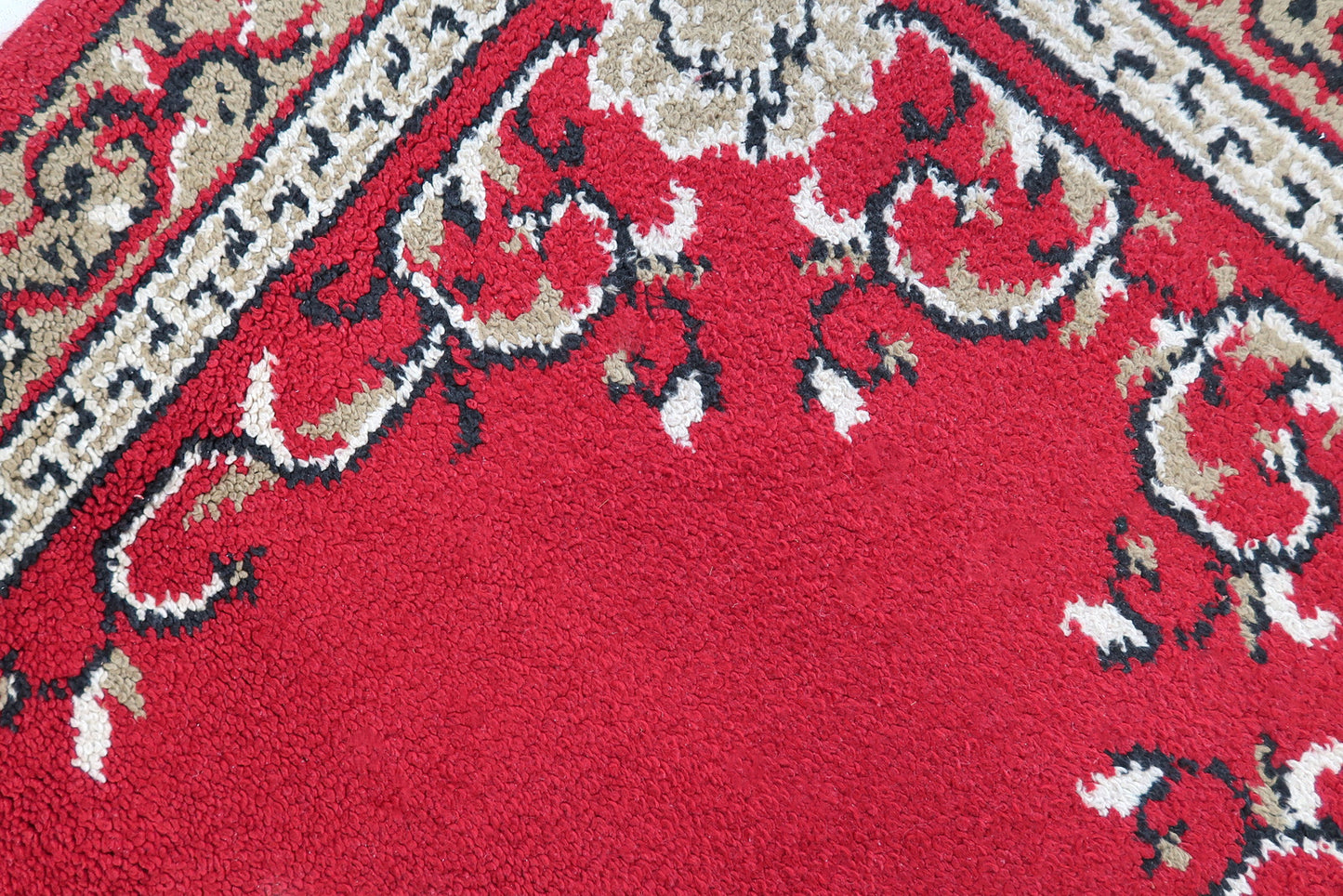 Vintage French Savonnerie woolen rug in bright red color and floral design. The rug is from the end of 20th century in original good condition.