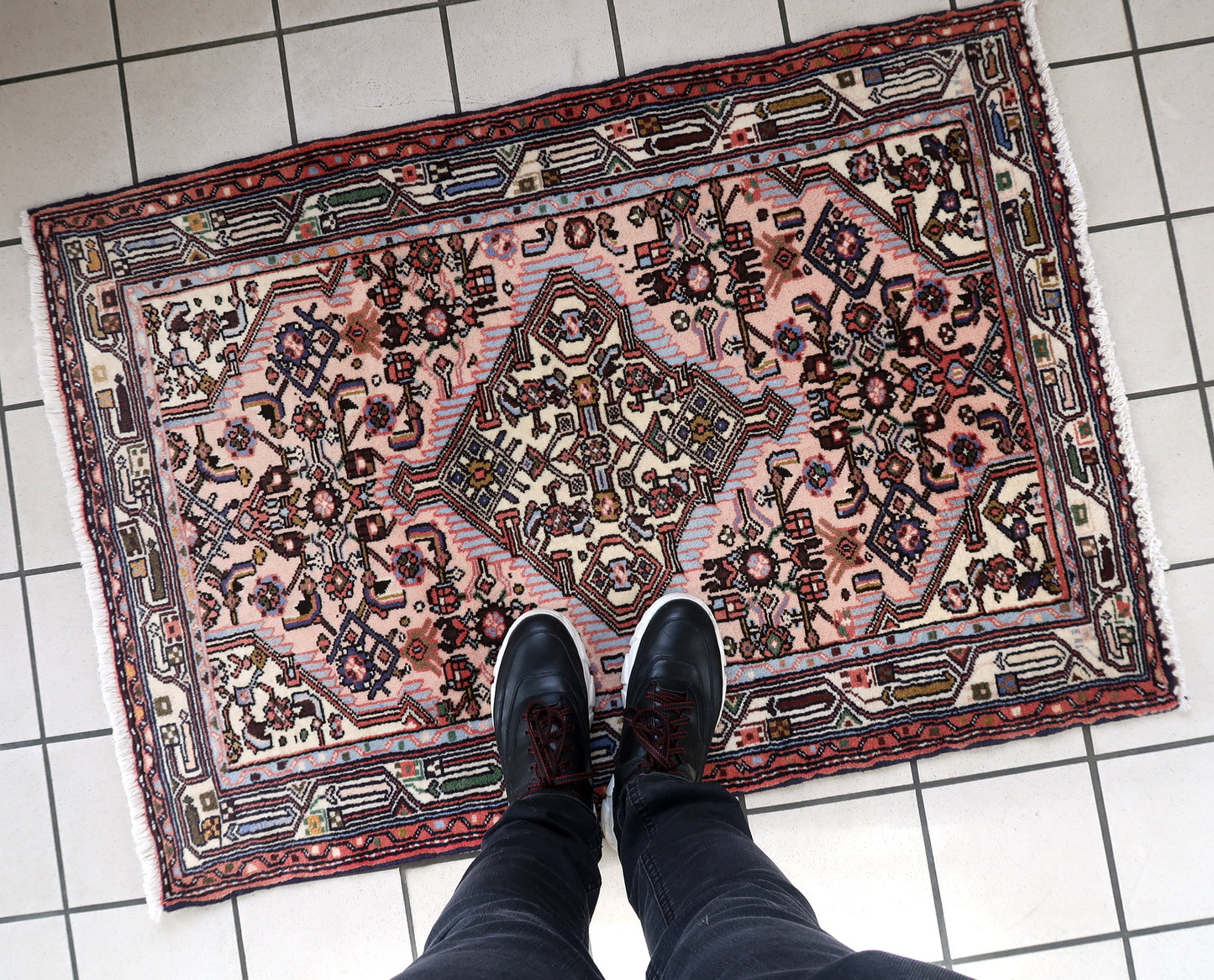 Handmade vintage Persian Malayer rug in pink color. The rug is from the middle of 20th century in original good condition.