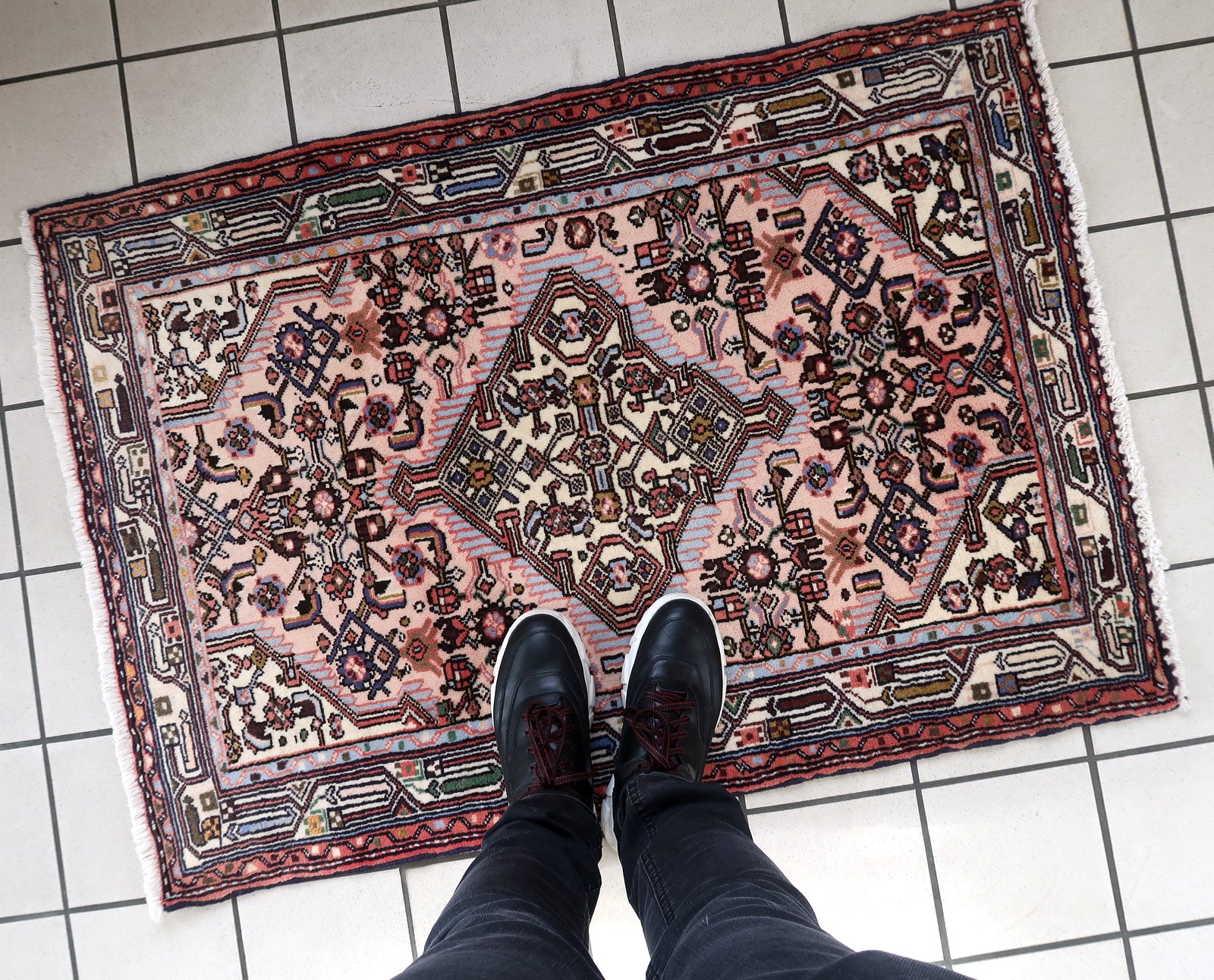 Handmade vintage Persian Malayer rug in pink color. The rug is from the middle of 20th century in original good condition.