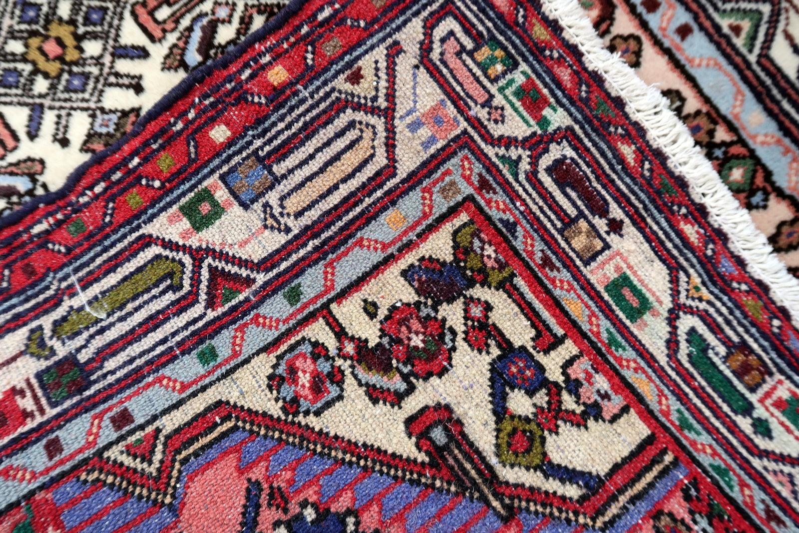 Handmade vintage Persian Malayer rug in pink color. The rug is from the middle of 20th century in original good condition.