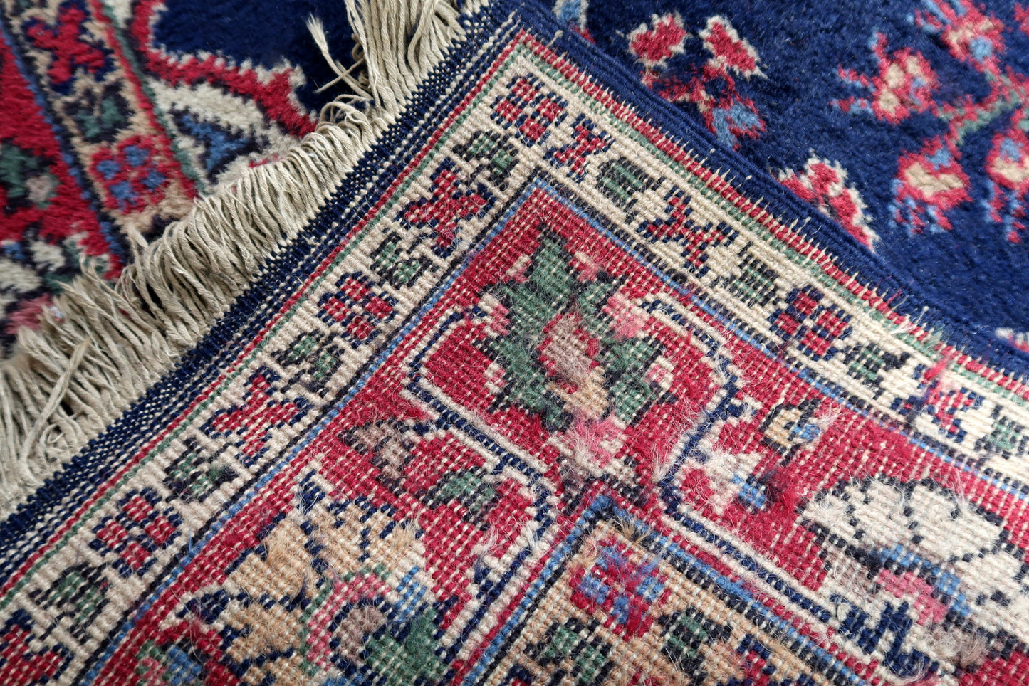 Handmade antique Persian Kerman rug in bright blue and red shades. The rug is from the beginnig of 20th century in good condition.