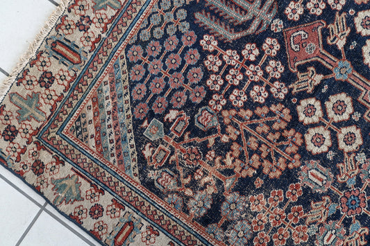 Handmade antique Persian distressed Jozan rug 1900ss
