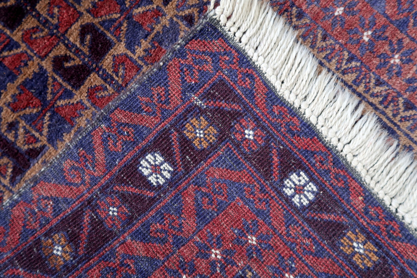 Handmade vintage Afghan Baluch rug in prayer design. The rug is from the end of 20th century in original good condition.