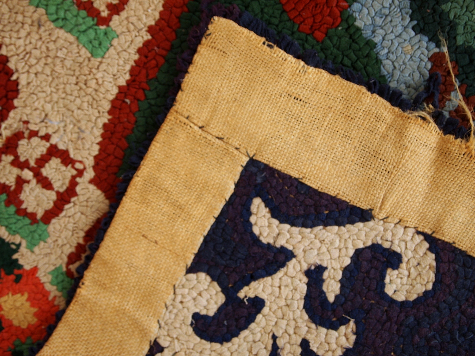Detailed view of the brown elements in the rug's design.