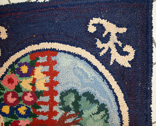 Detailed view of the rug's intricate pictorial design in vibrant shades