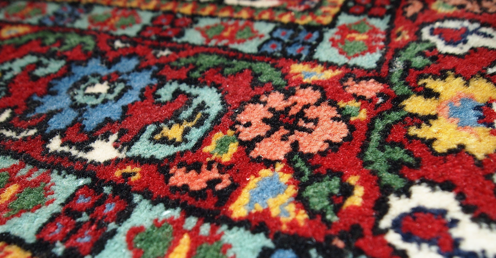 Close-up of floral pattern on antique Indian Mahal rug