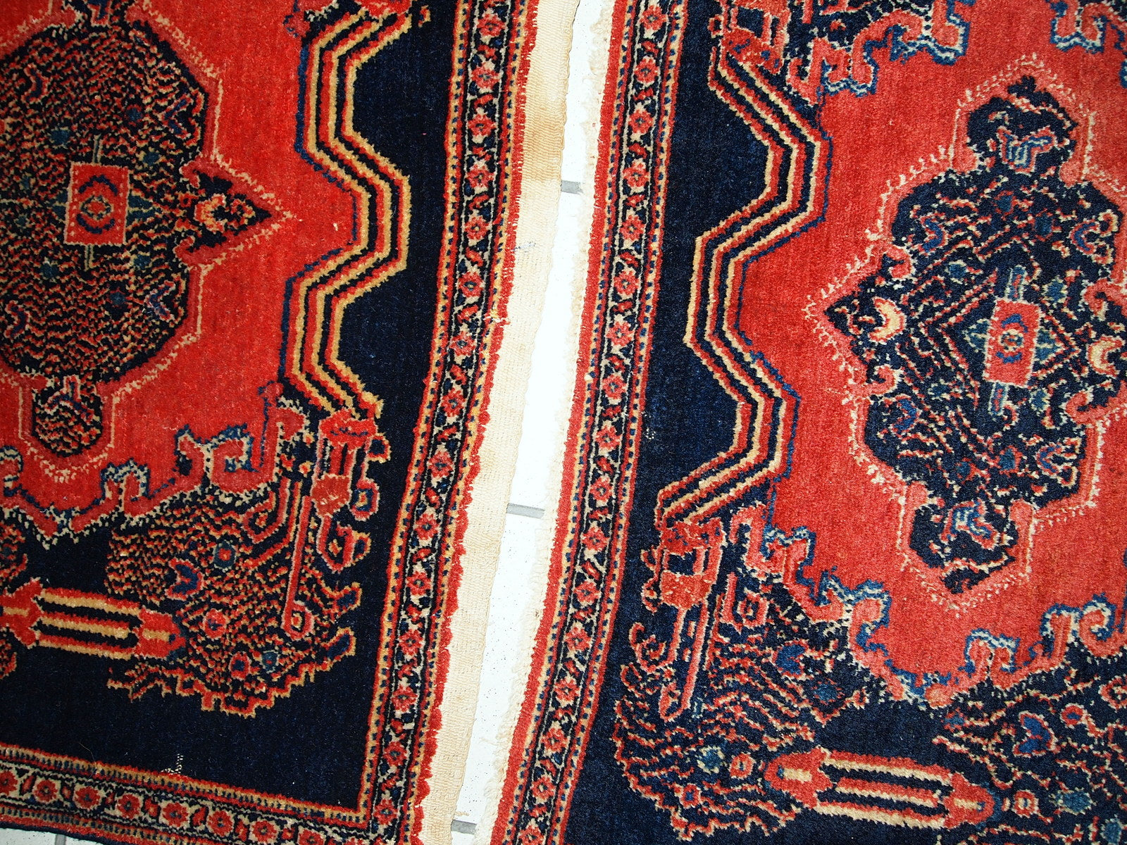 Handmade antique Persian pair of Senneh rugs, 1900s