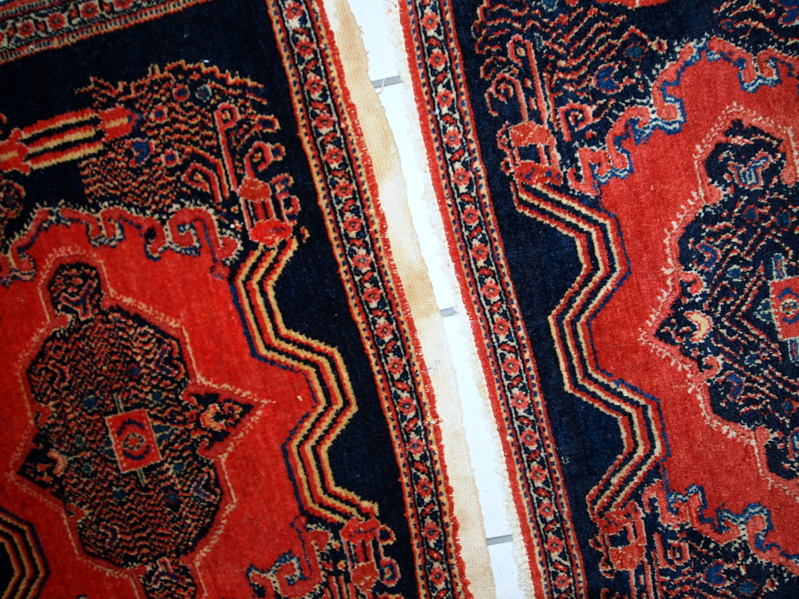 Handmade antique Persian pair of Senneh rugs, 1900s