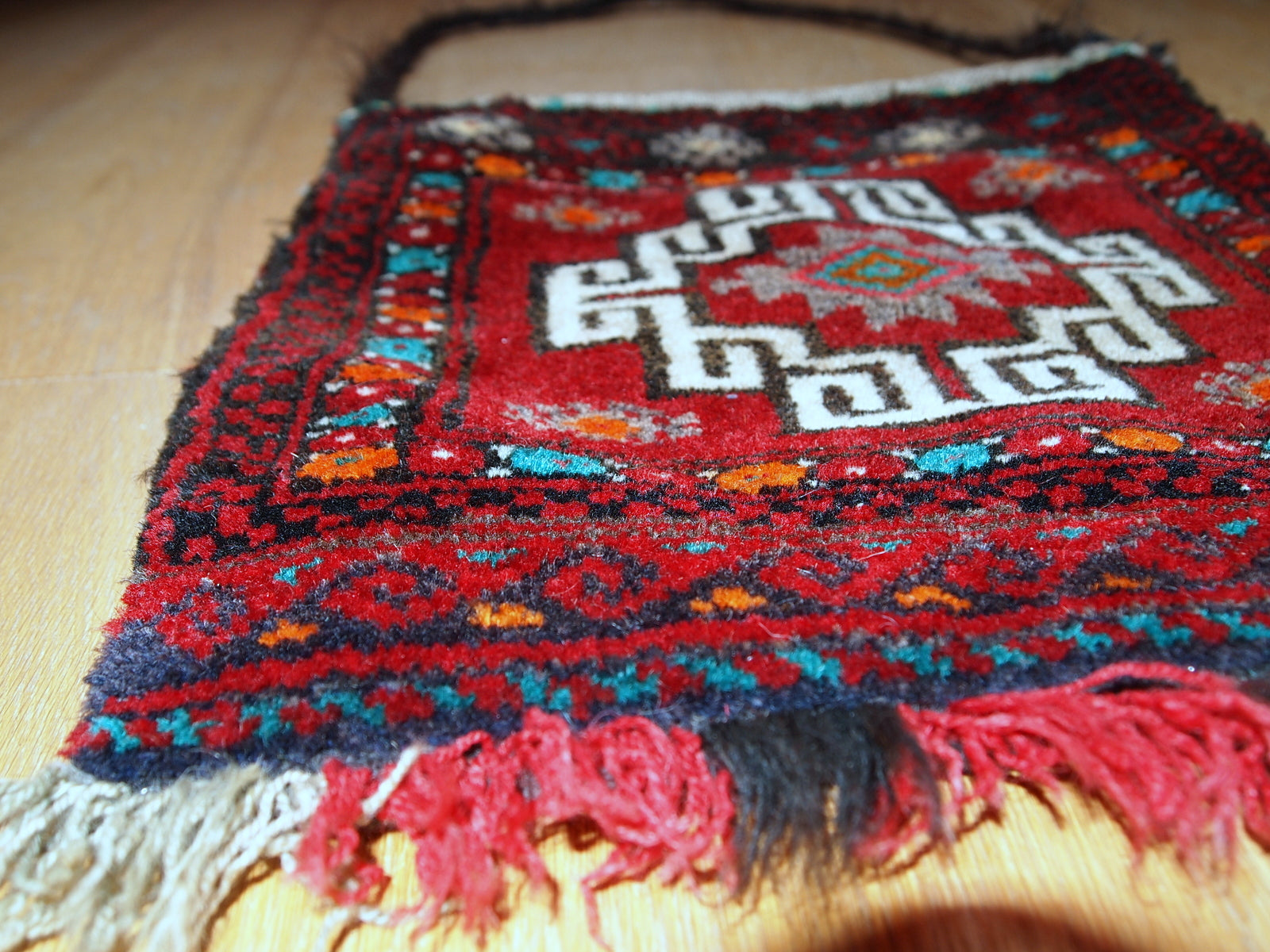 Hand crafted Turkish Anatolian bag in original good condition. The bag is from 1970s in red, orange and turquoise shades.