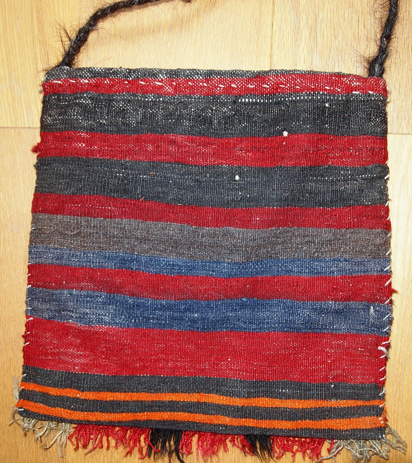 Hand crafted Turkish Anatolian bag in original good condition. The bag is from 1970s in red, orange and turquoise shades.