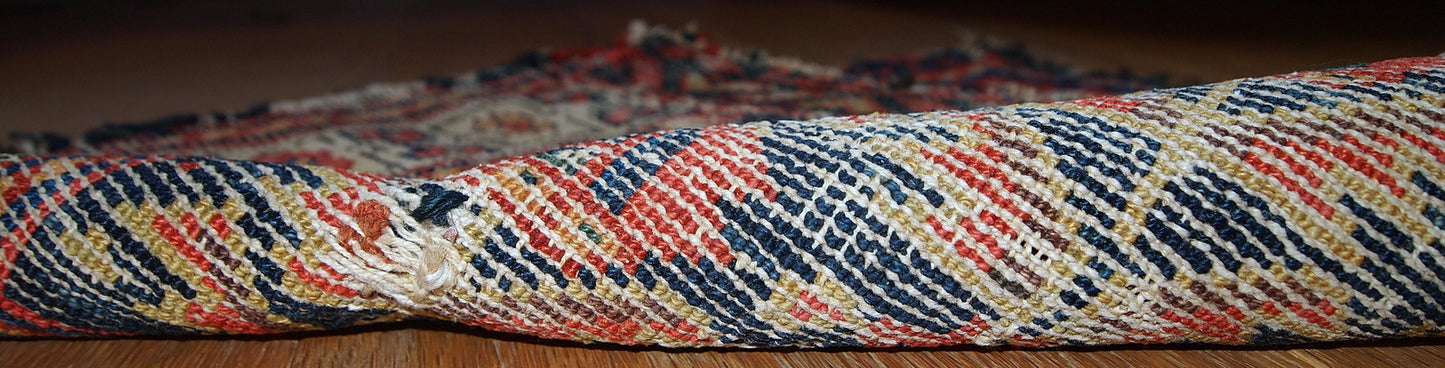 Hand made antique Malayer bag face in original condition with some age wear. The rug made has traditional tribal design in navy blue, white and red shades. 