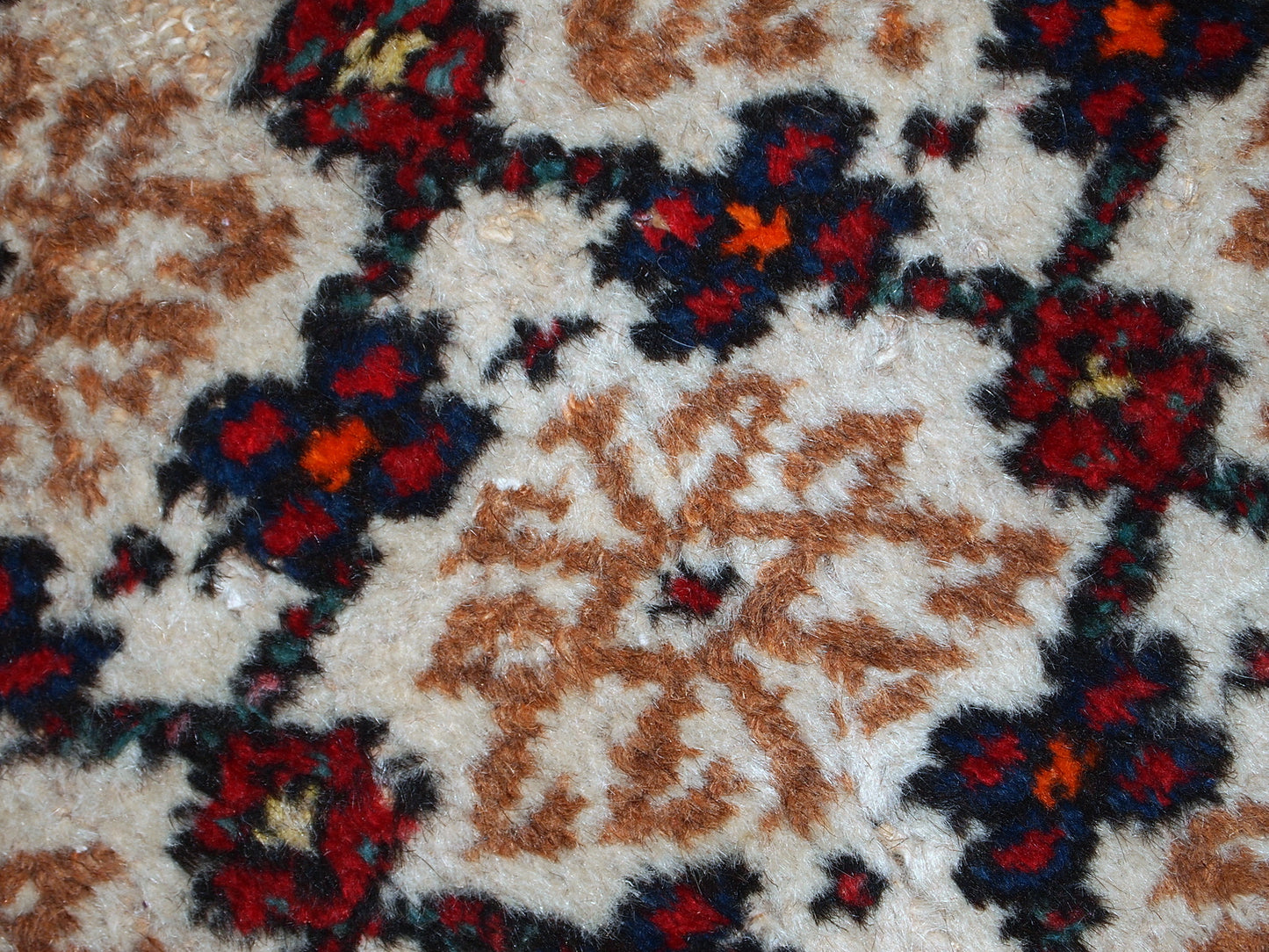 Antique Hamadan runner in good original condition. The rug is in white, red and blue shades.
