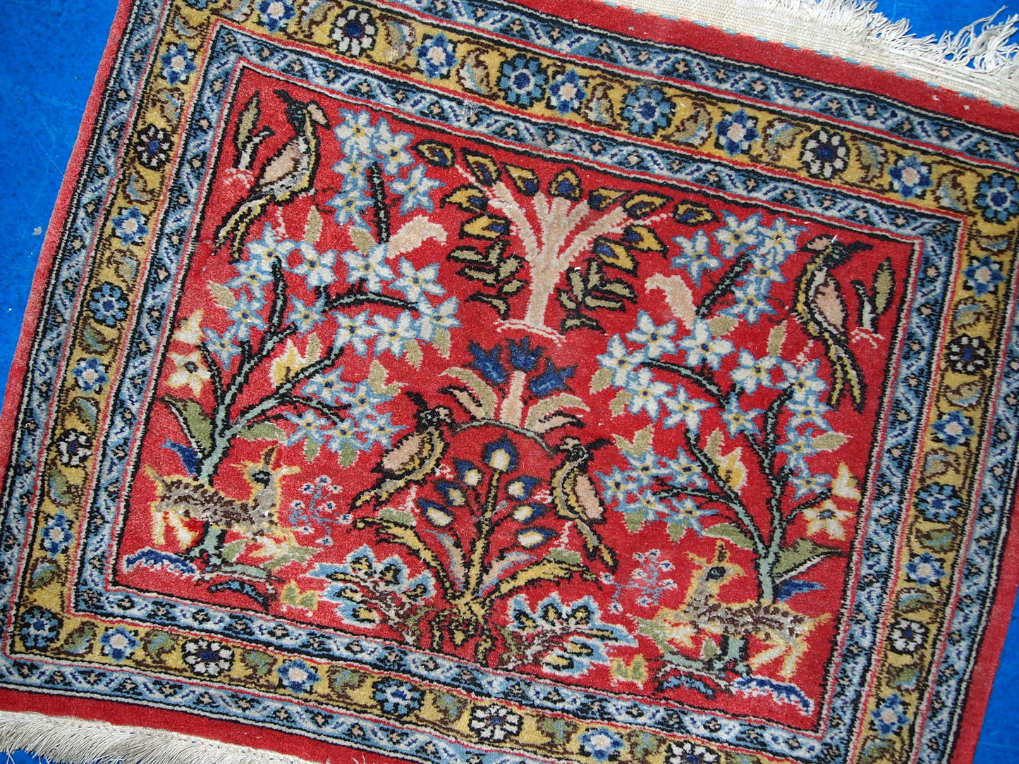 Vintage Persian Tabriz mat in original good condition. This rug made in red, sky blue and yellow wool.