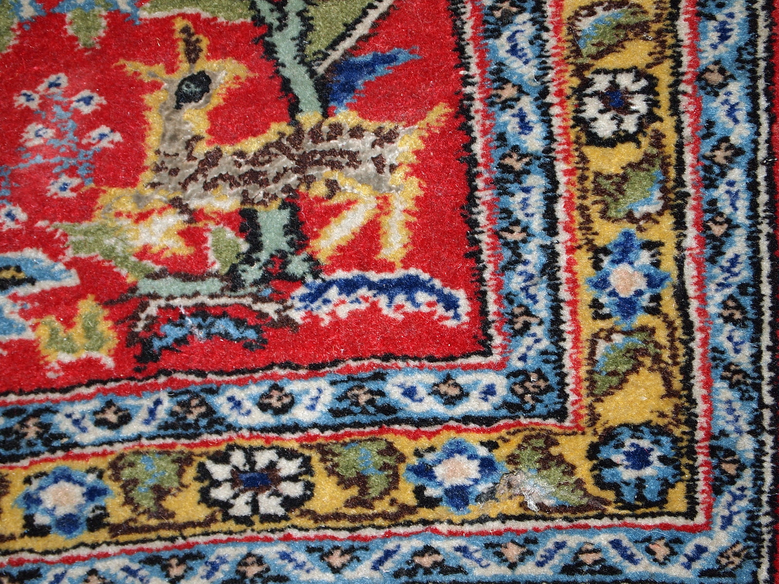 Vintage Persian Tabriz mat in original good condition. This rug made in red, sky blue and yellow wool.