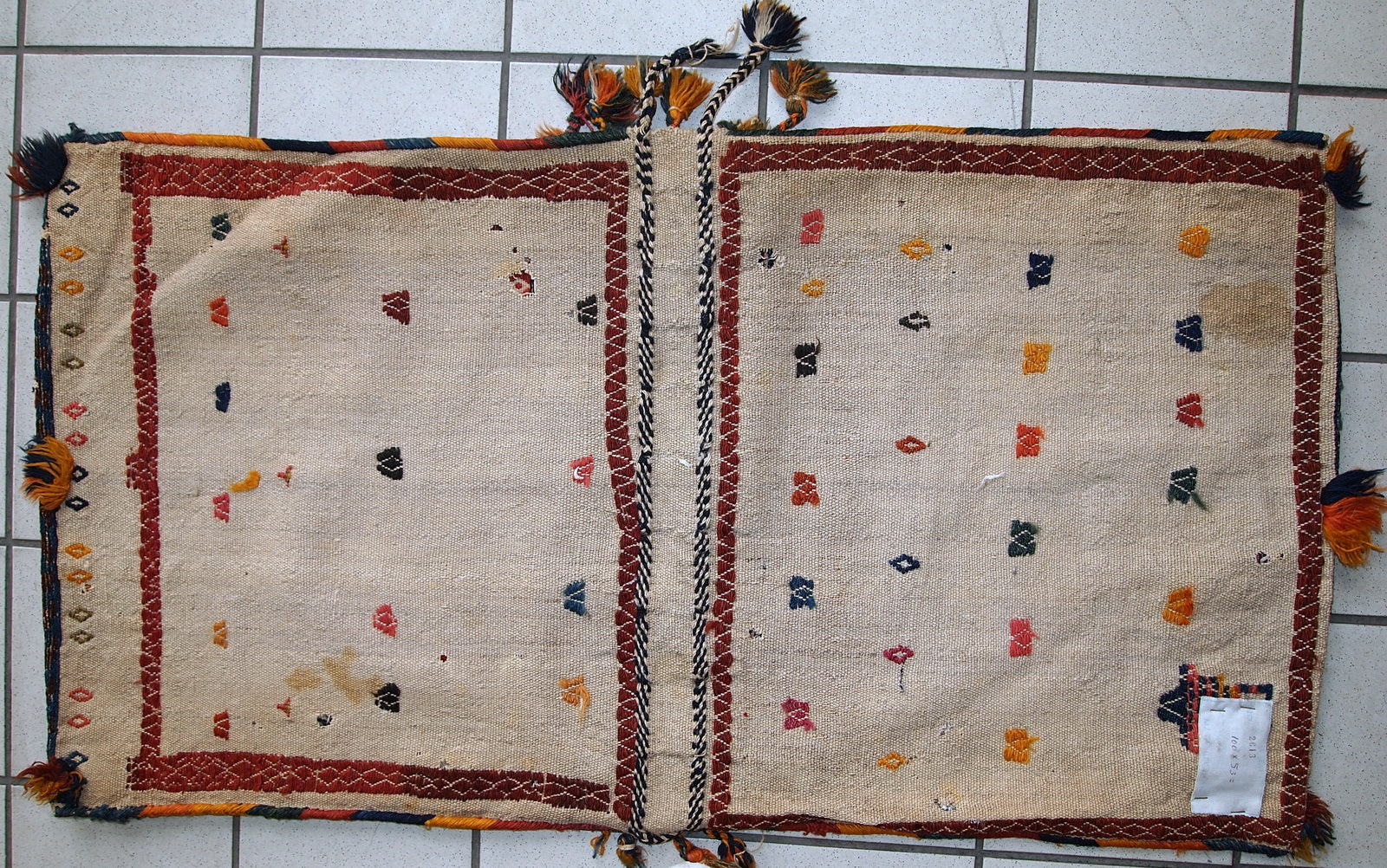 Antique collectible Persian Sumak saddle double bag in original good condition. The bag is from the middle of 20th century.