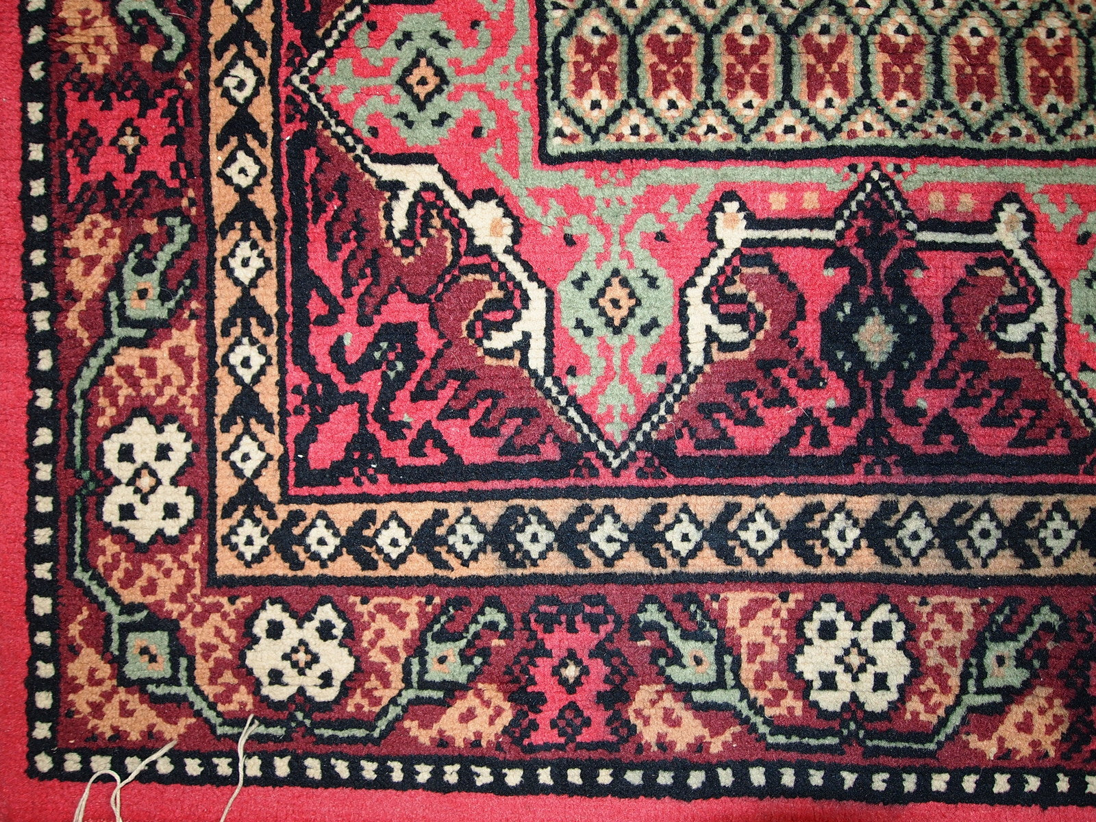 Vintage Algerian Berber rug in original good condition. This rug is from the end of 20th century made in pink wool.