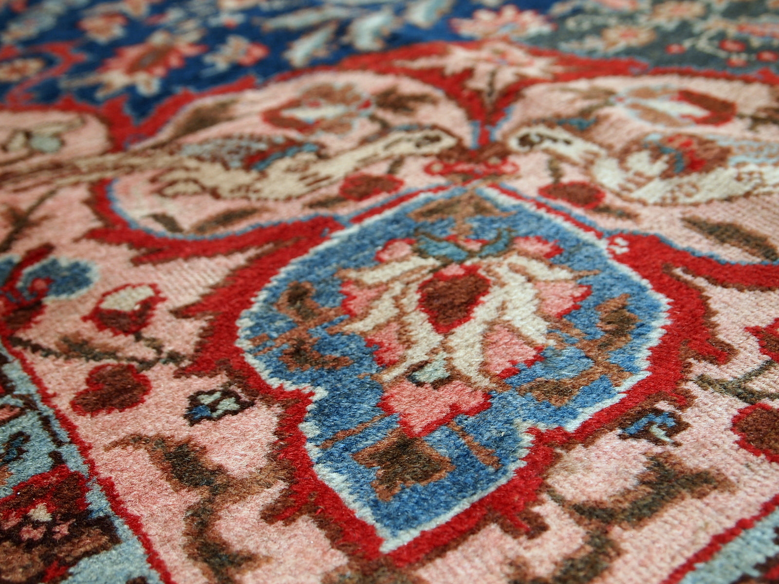 Antique Tabriz rug in original good condition. This beautiful masterpiece made in the beginning of 20th century in navy blue and pink shades.