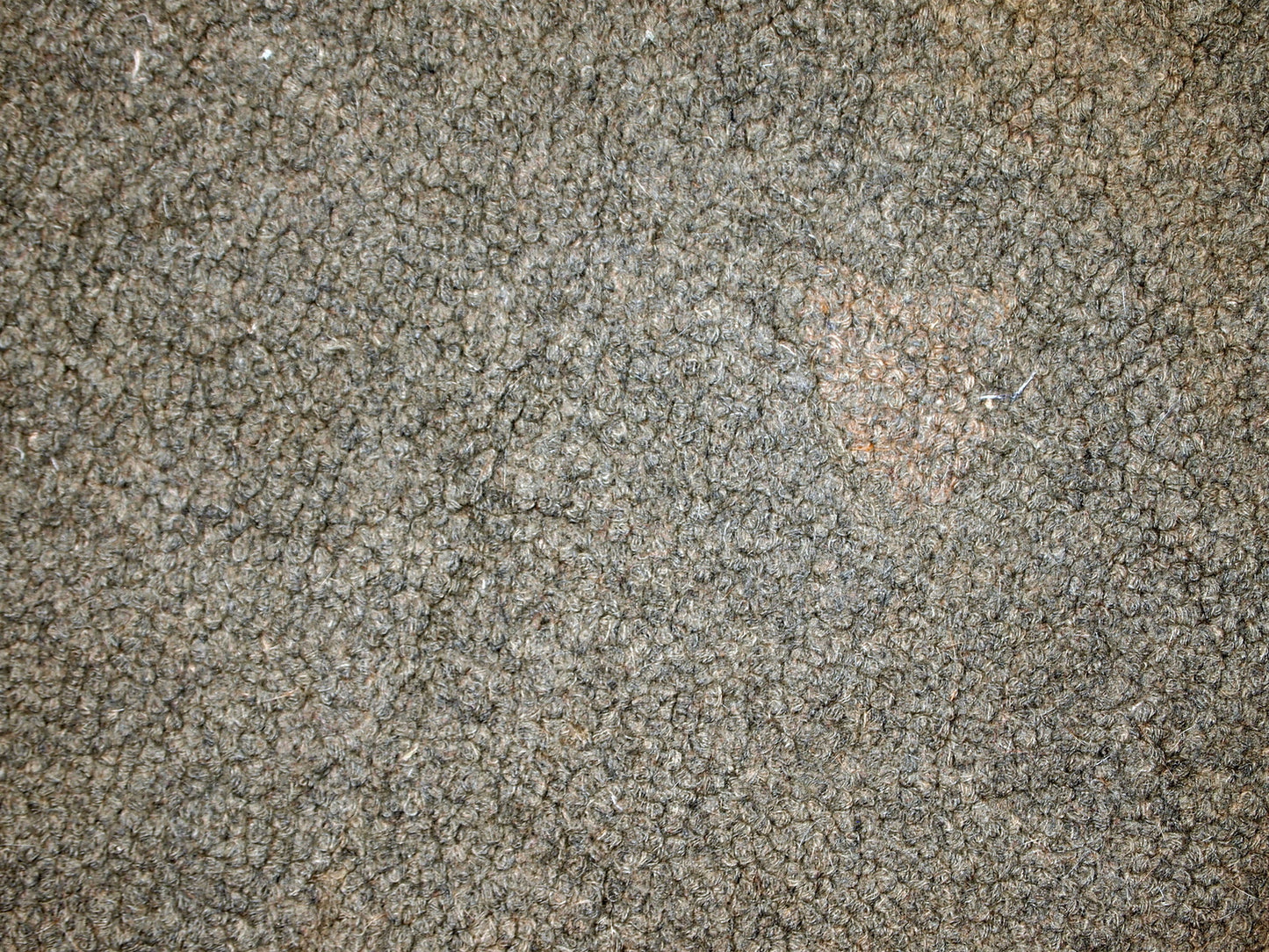 Antique decorative American hooked rug with allover design in grey shade. The condition is original good.