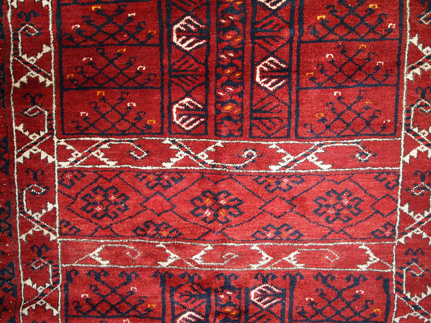 Vintage Engsi rug in original good condition. It has been made in the middle of 20th century in Turkmenistan.