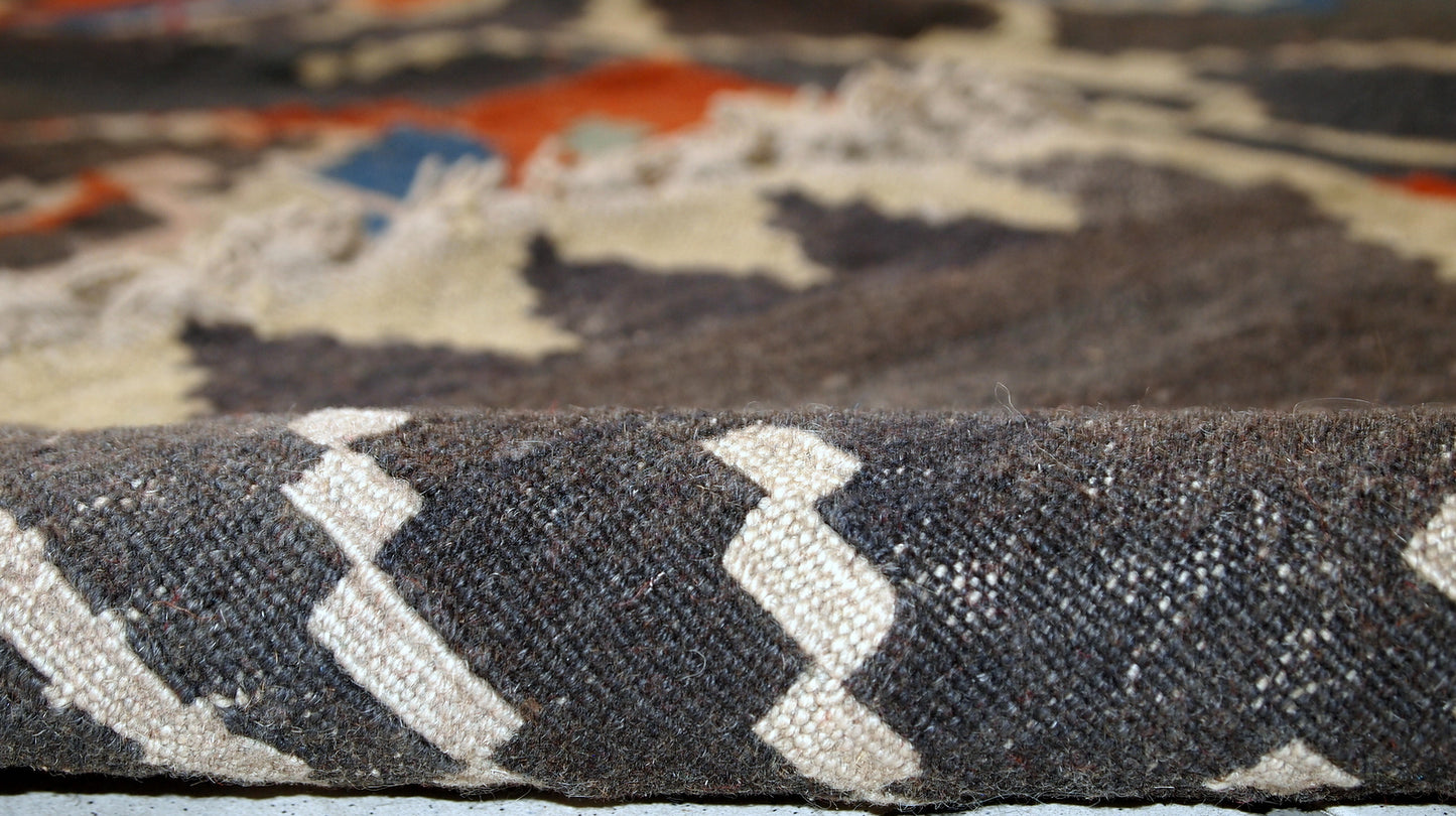 Antique hand made Caucasian Karabagh flat-weave in original good condition. This kilim has been made in black color and abstract design in the beginning of 20th century.
